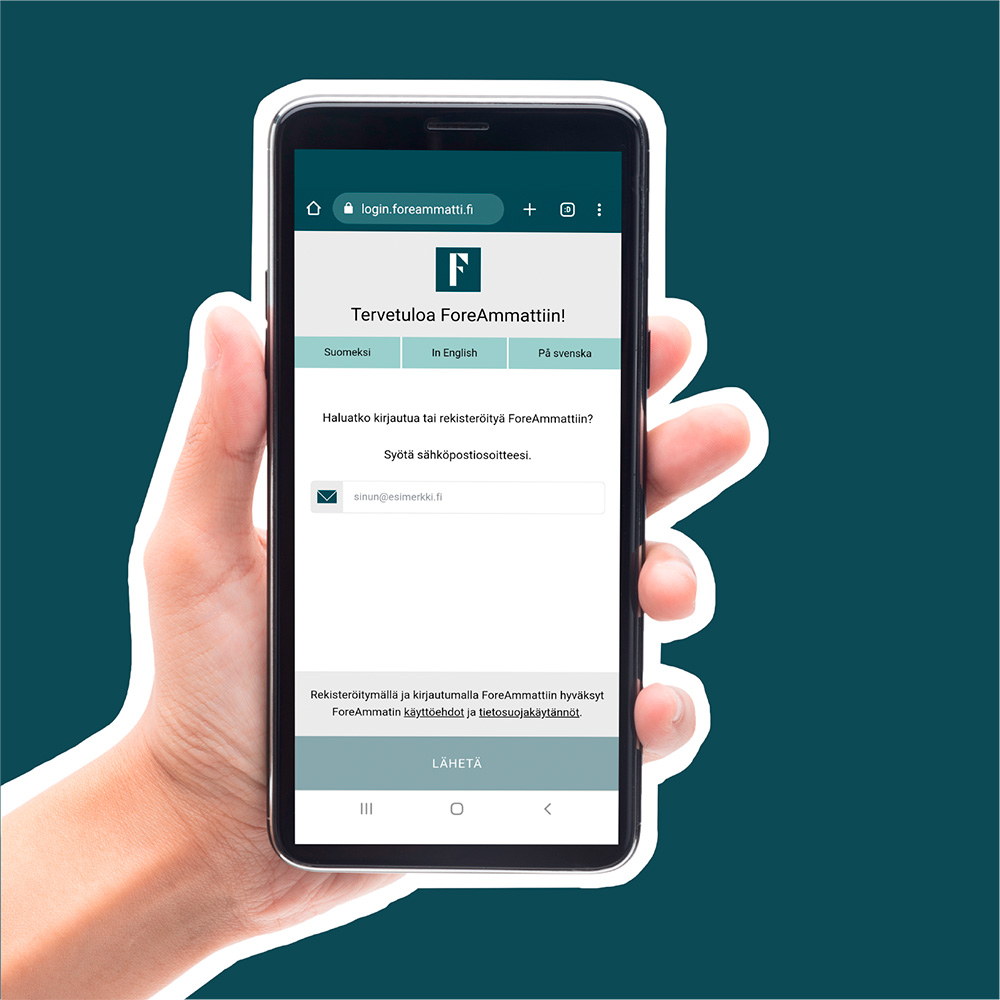 Vasen käsi pitelee älypuhelinta, jonka ruudulla on ForeAmmatin kirjautumisen ensimmäinen vaihe eli sähköpostiosoitteen antaminen.